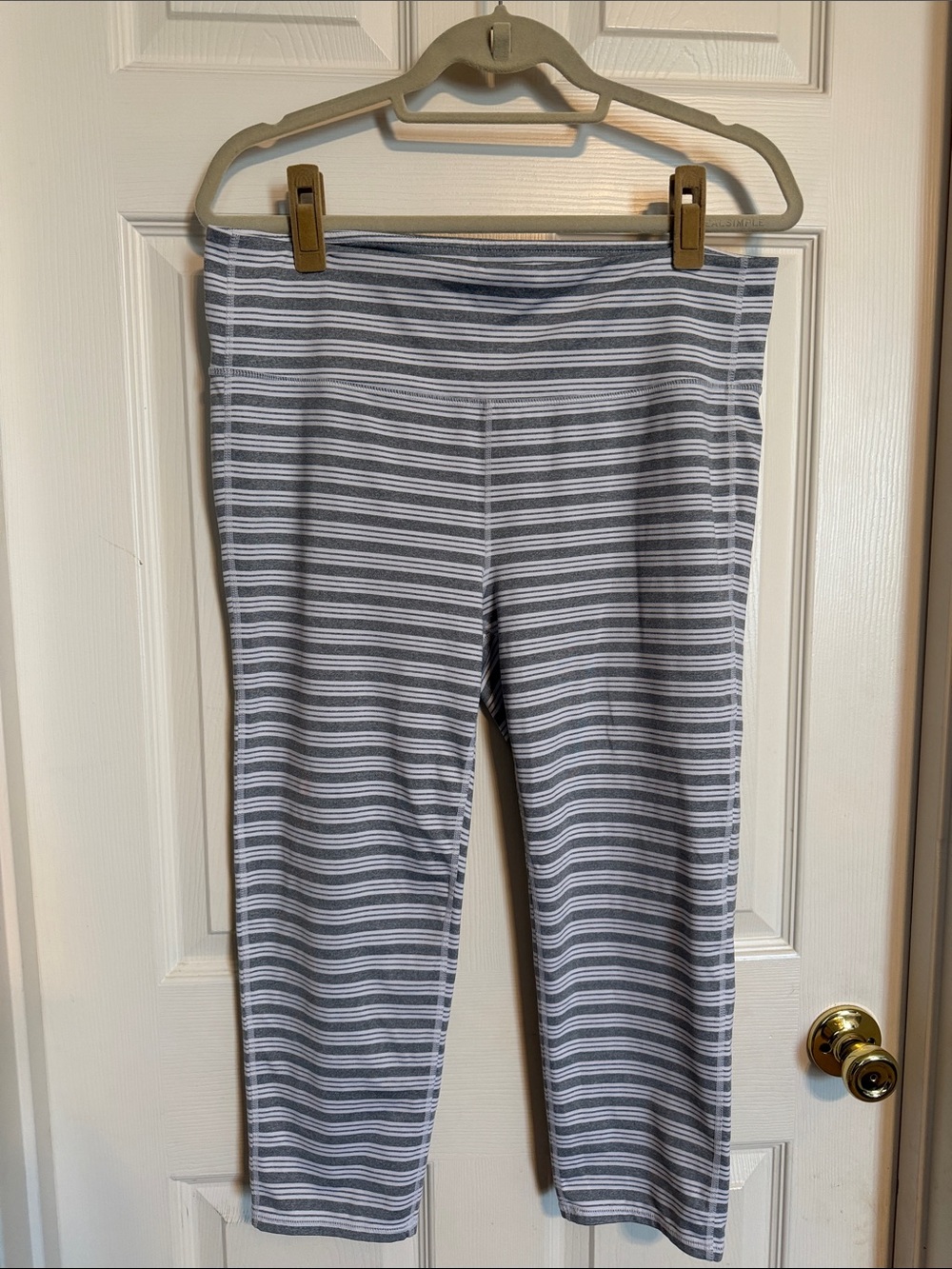 Athleta Gray and White Striped Cropped Leggings